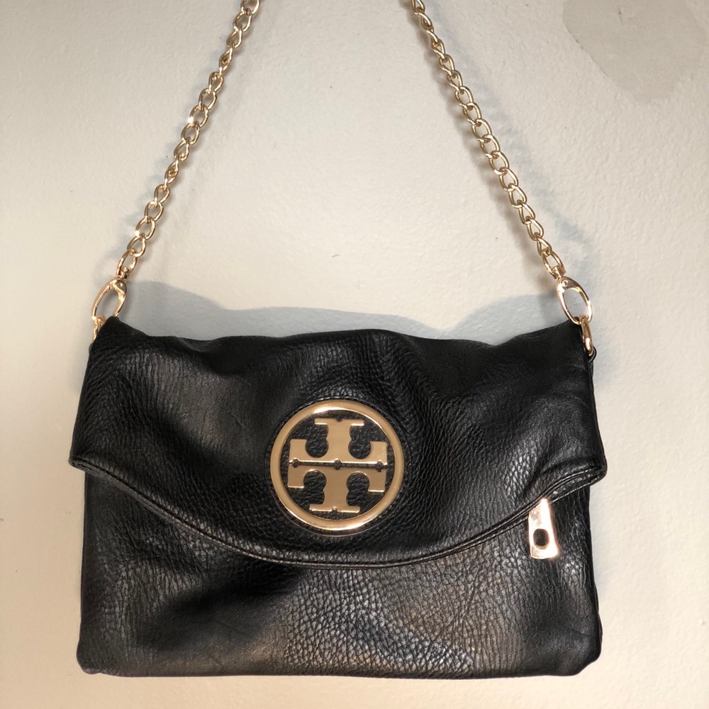 Tory Burch black leather clutch with gold chain and hardware
